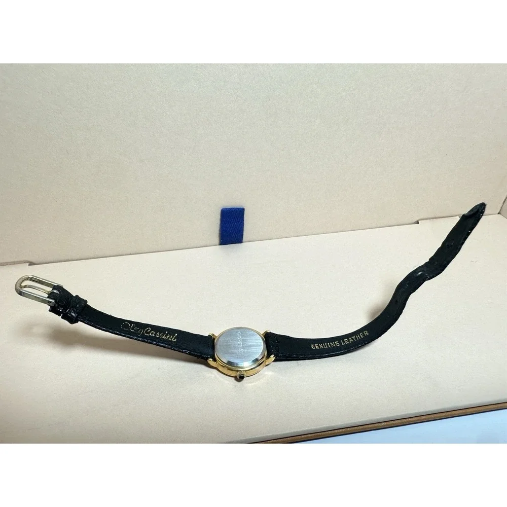 Oleg Cassini Women's Quartz Watch 25.4mm Gold Tone Leather Band‎